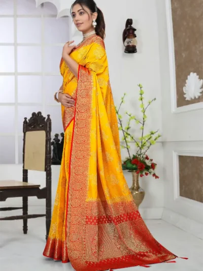 Mustard yellow zari saree with red border and designer pallu