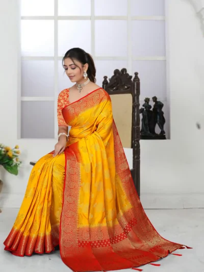 Mustard yellow zari woven saree with red border and designer pallu