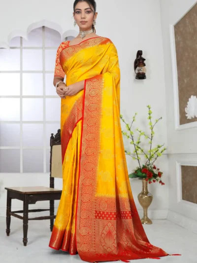 Mustard yellow zari woven saree with red border and designer pallu