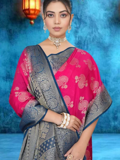 Rani pink crepe saree with blue zari border worn by Indian model
