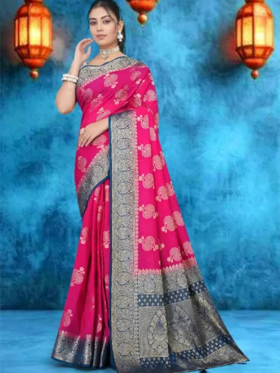 Rani pink crepe saree with blue zari border worn by Indian model