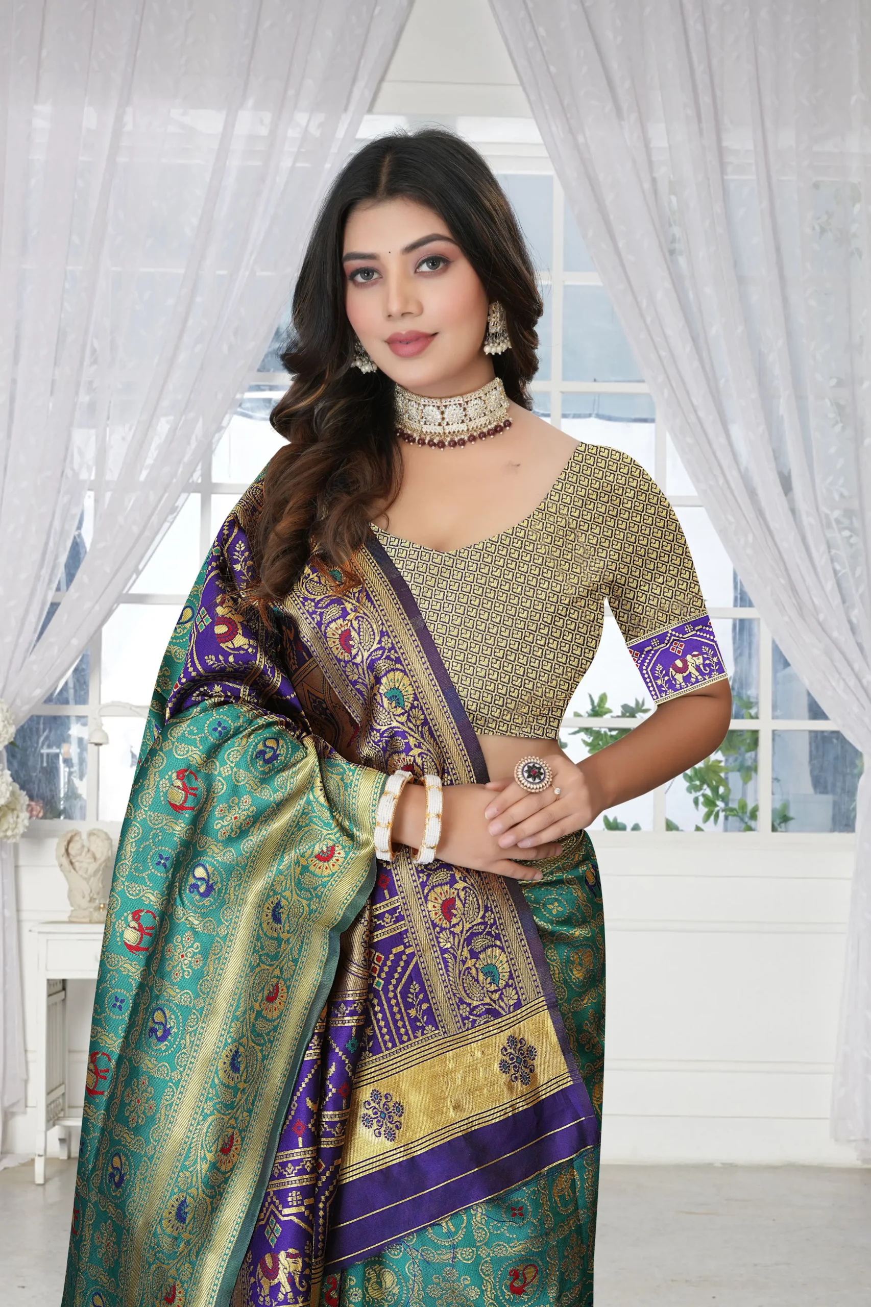 Aqua blue silk blend saree with zari work border and stylish pallu