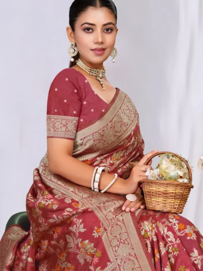 Dusty Mauve raw silk saree with intricate zari and thread floral weaving, rich border, and matching running blouse by Maharanga.